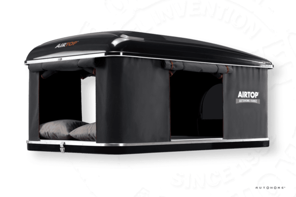 Otevřený střešní stan Airtop hard shell by Autohome v černé barvě otevřený s polštářem