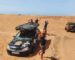Opel Corsa mit Dachzelt in der Wüste in Marokko in LAYZEE Stories